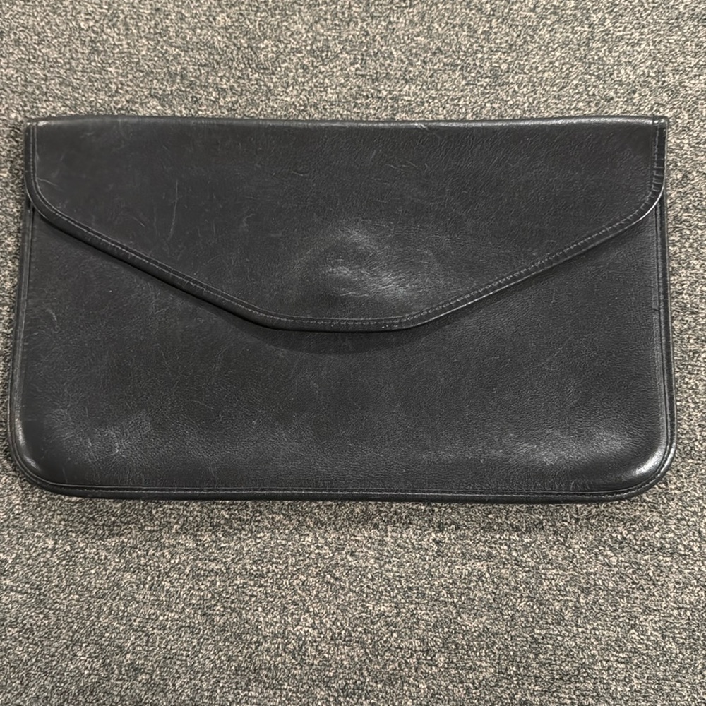 Michael Green leather clutch